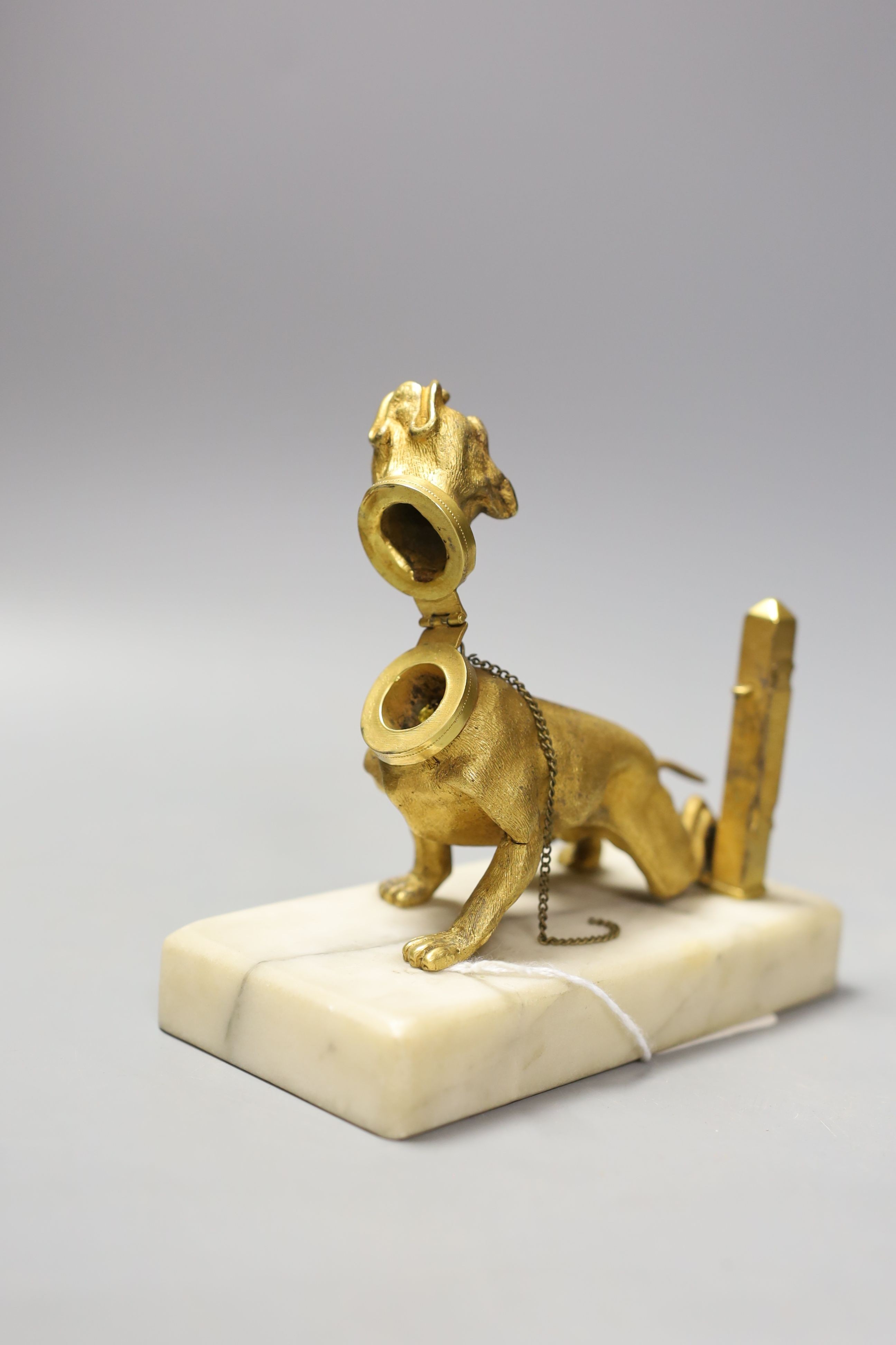 A French ormolu ‘dog’ match tidy on alabaster base 14.5cm